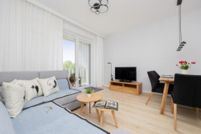 Stacja Wola Nowoczesny Apartament z Balkonem i Parkingiem Warszawa by Noclegi Renters